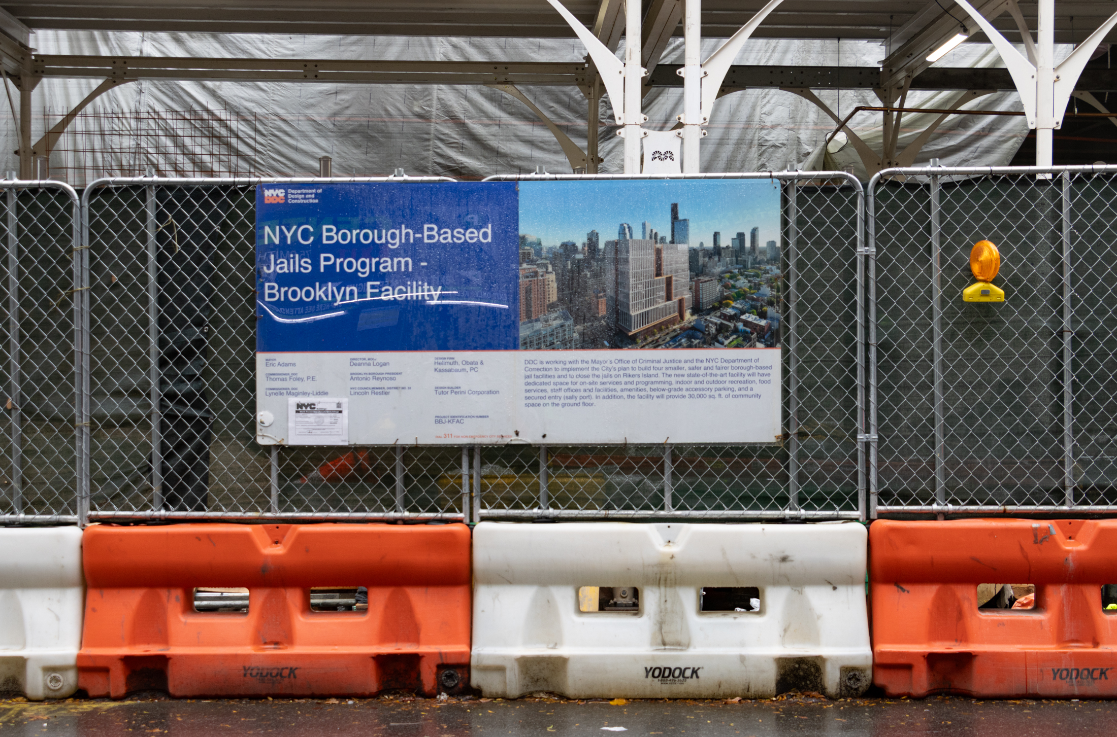 sign with a rendering of the new jail