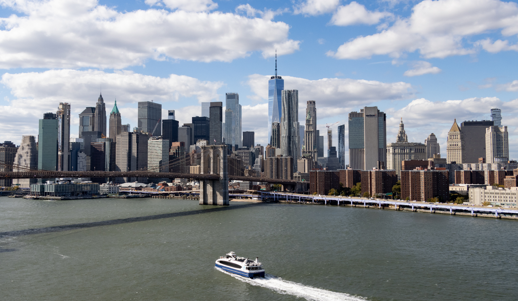 ferry and the manhattan skyline