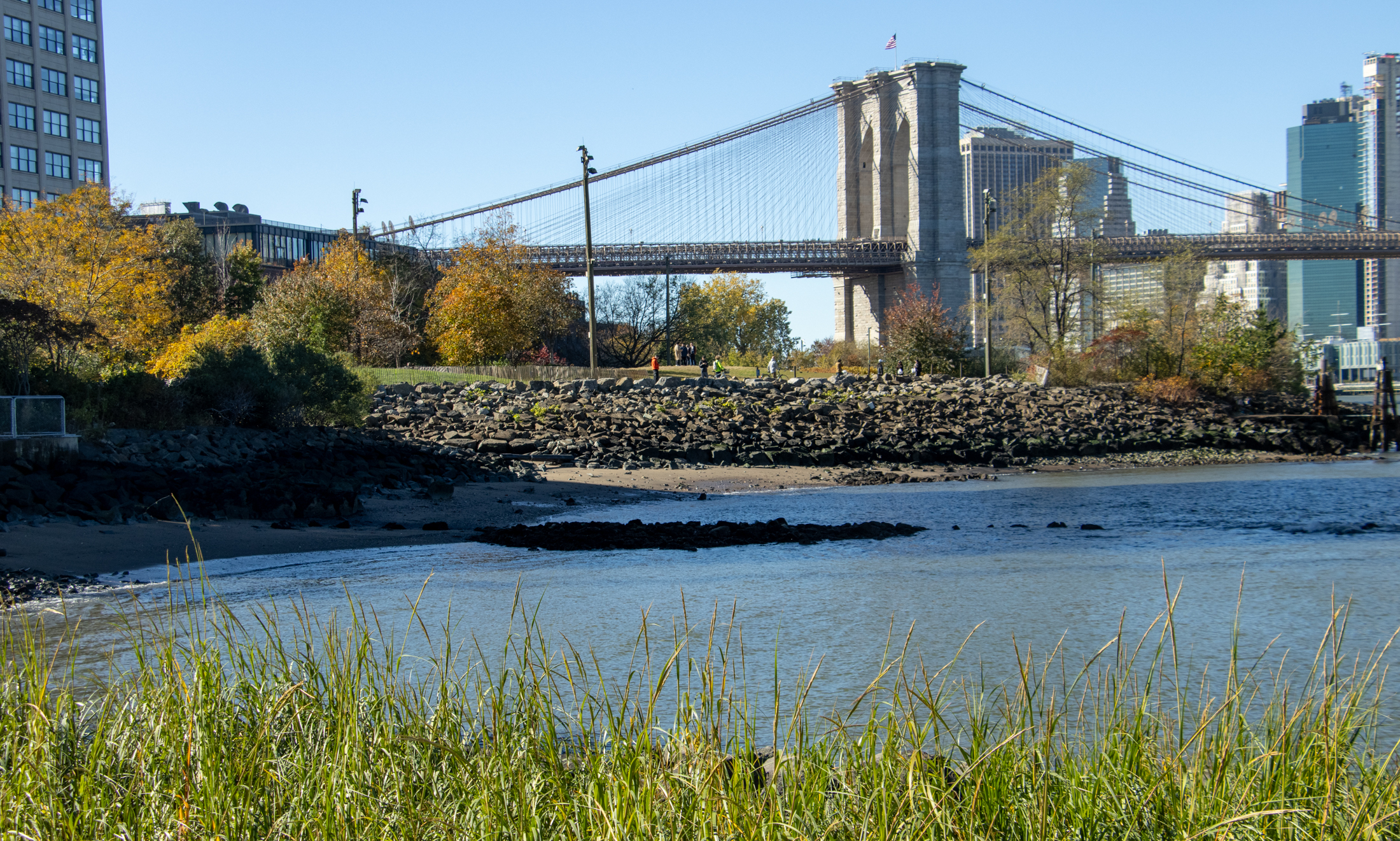 view of the brooklyn bridge from Dumbo and the Brooklyn Bridge Park