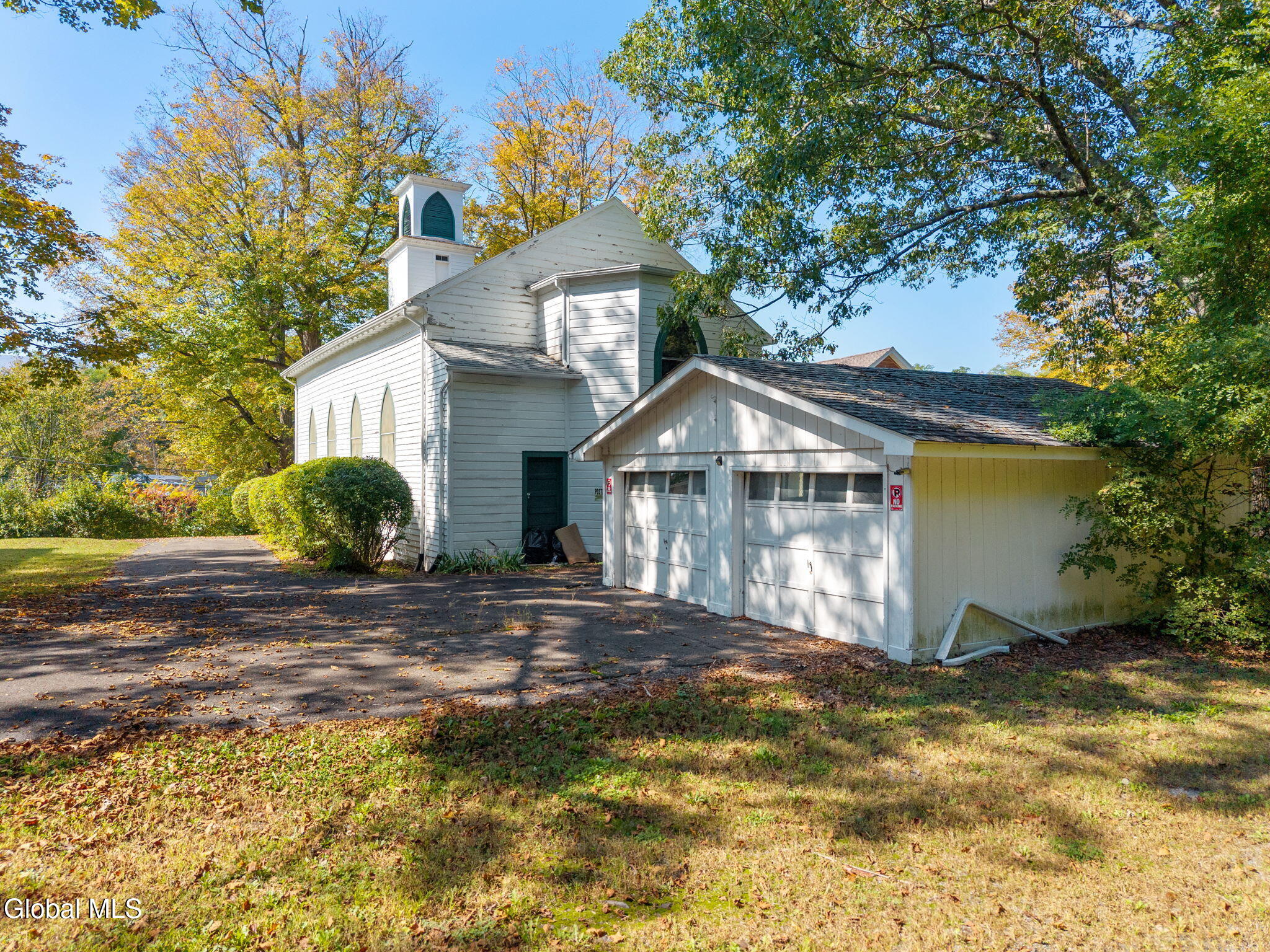 garage located behind the church