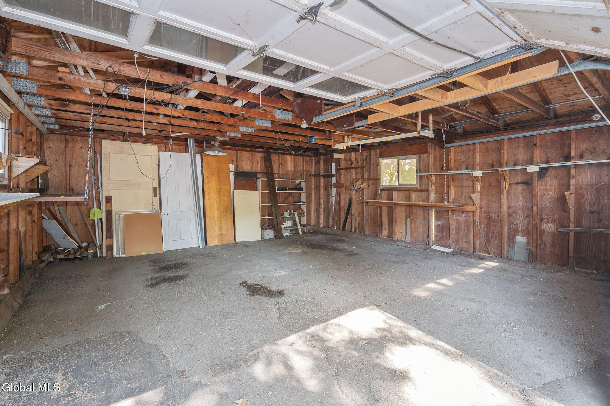 interior of garage with cement pad