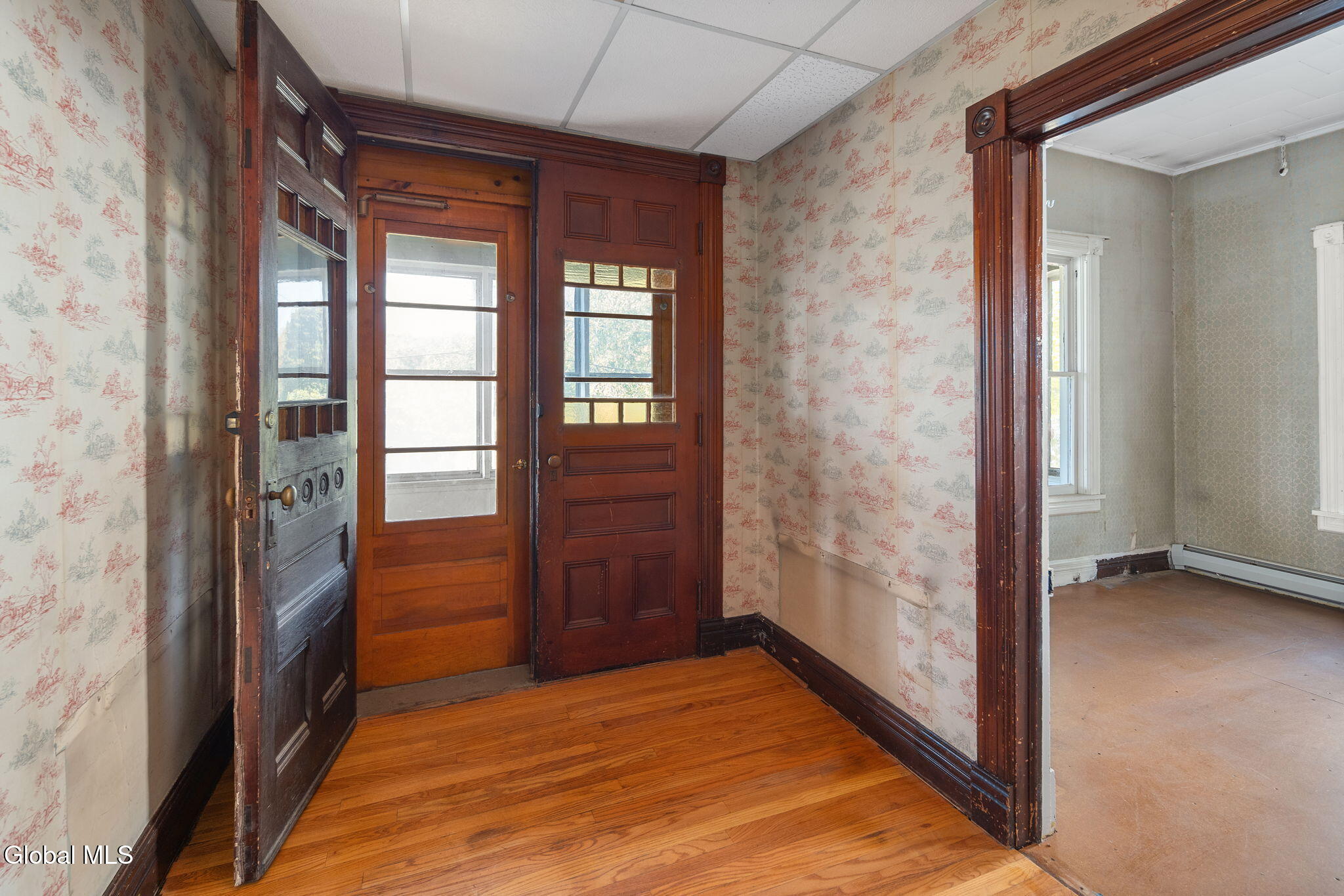 entry with double doors with stained glass