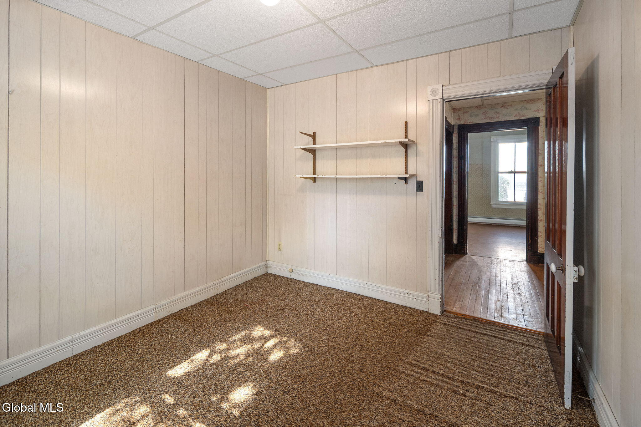 office with carpet and paneling