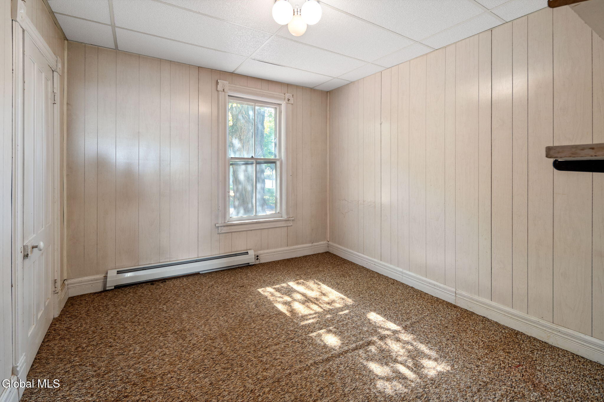 office with carpet and paneling