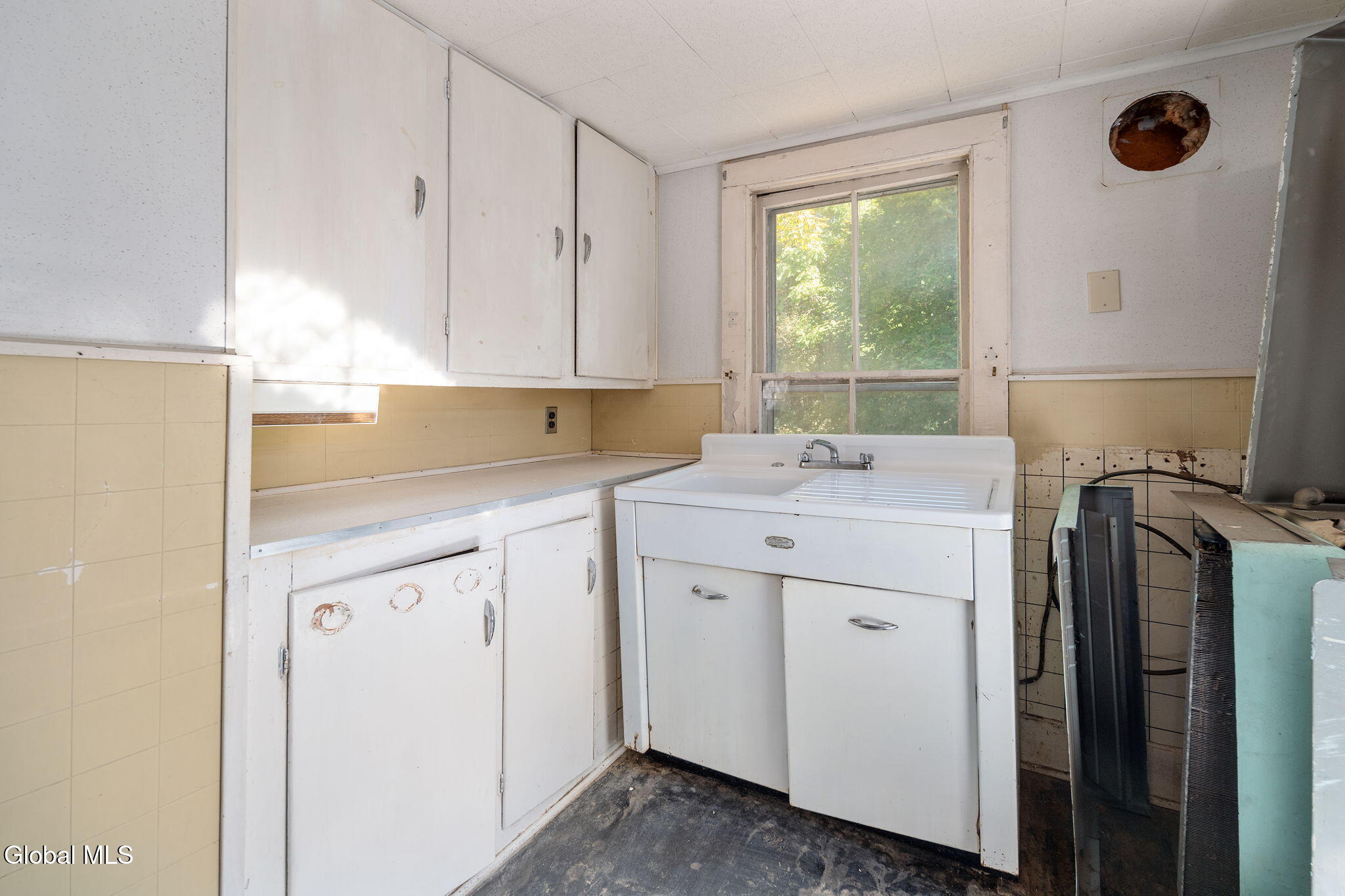 second floor kitchen with vintage sink cabinet