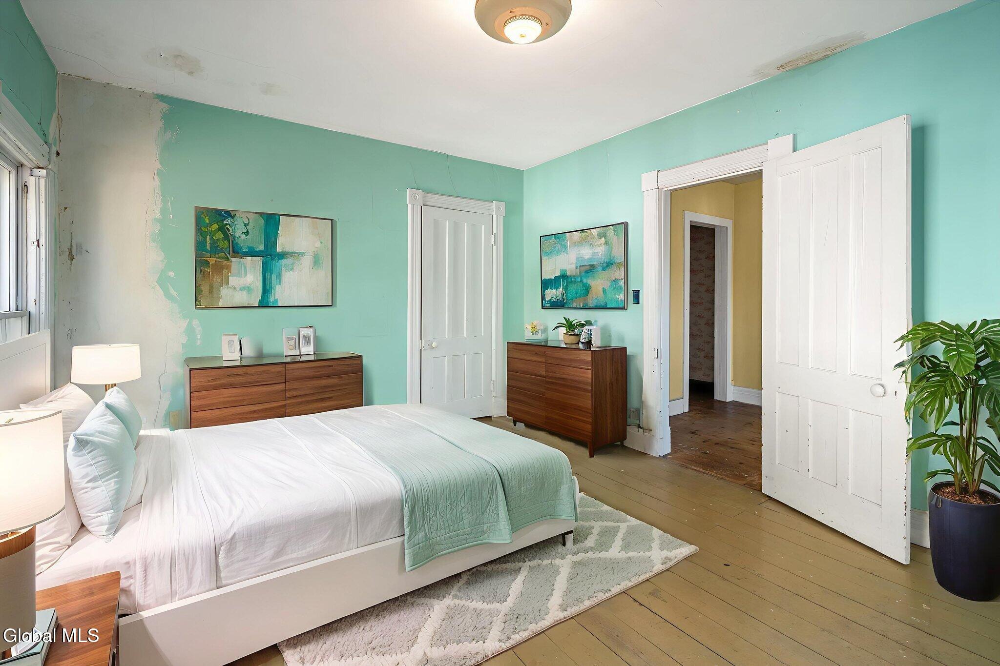 virtually staged bedroom with green walls