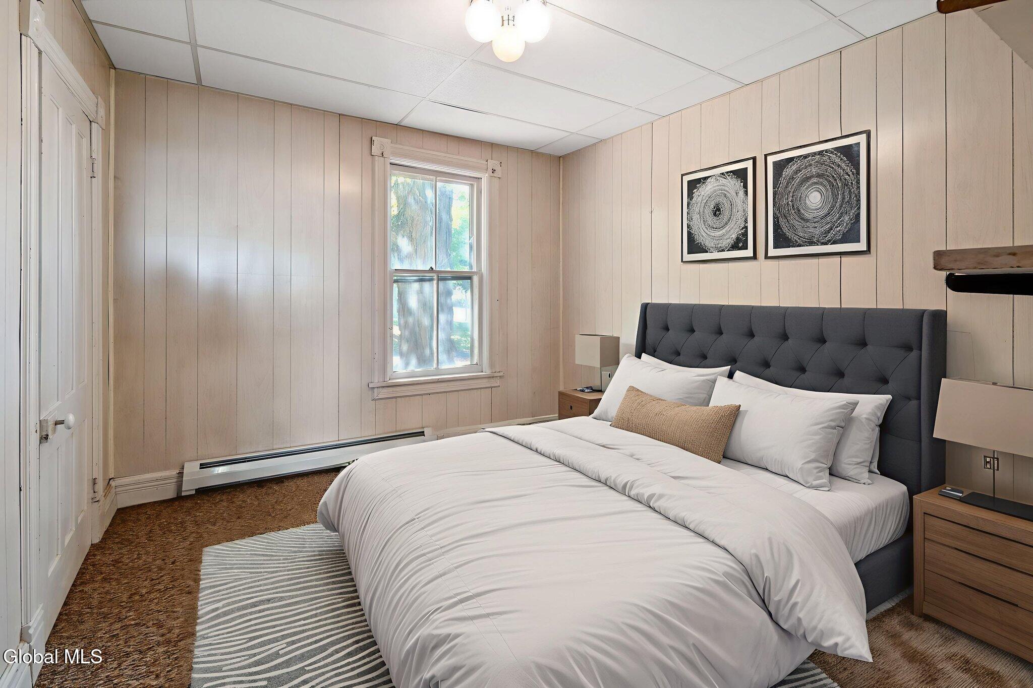 virtually staged bedroom with paneling