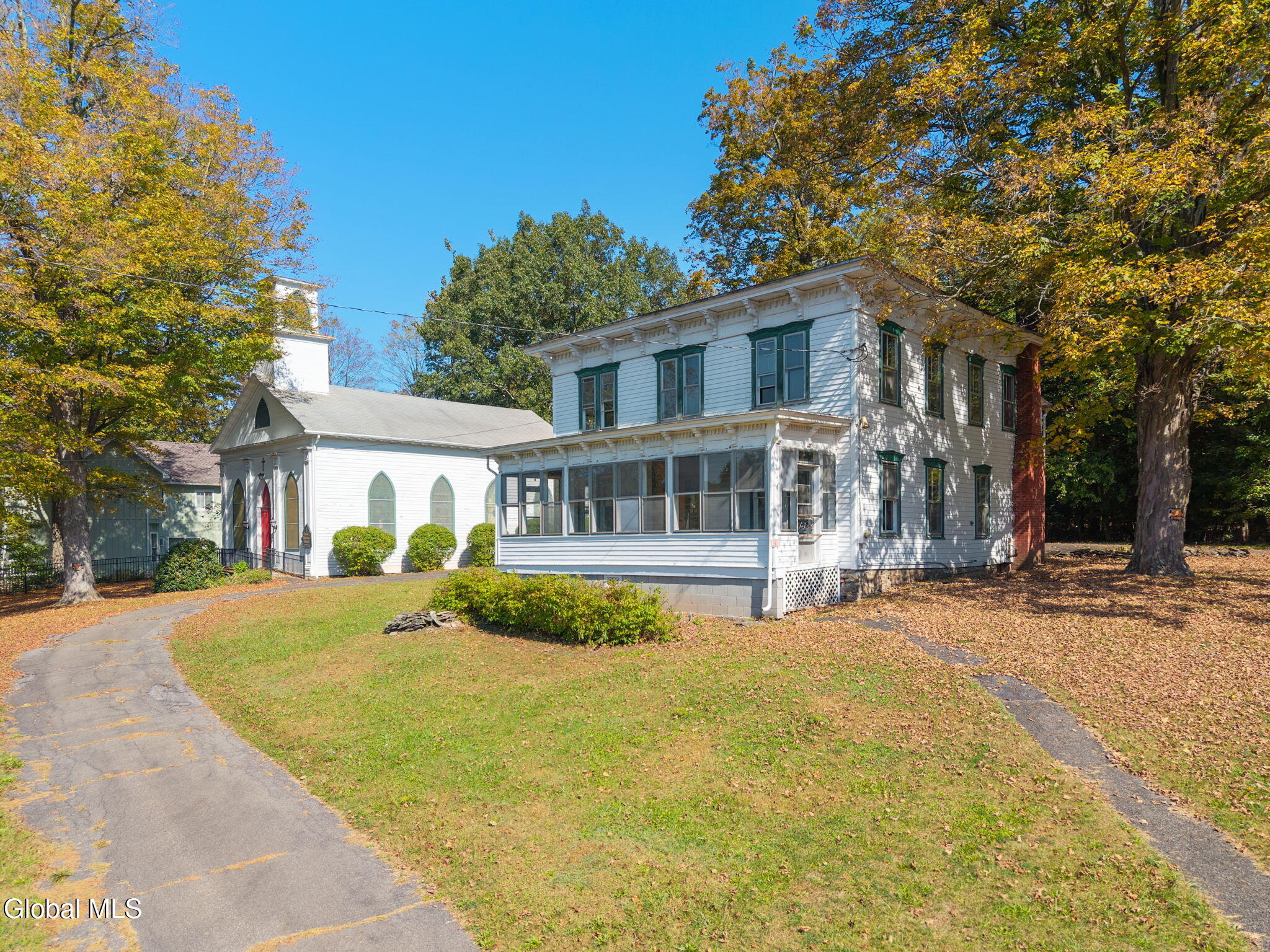 white clapboard rectory