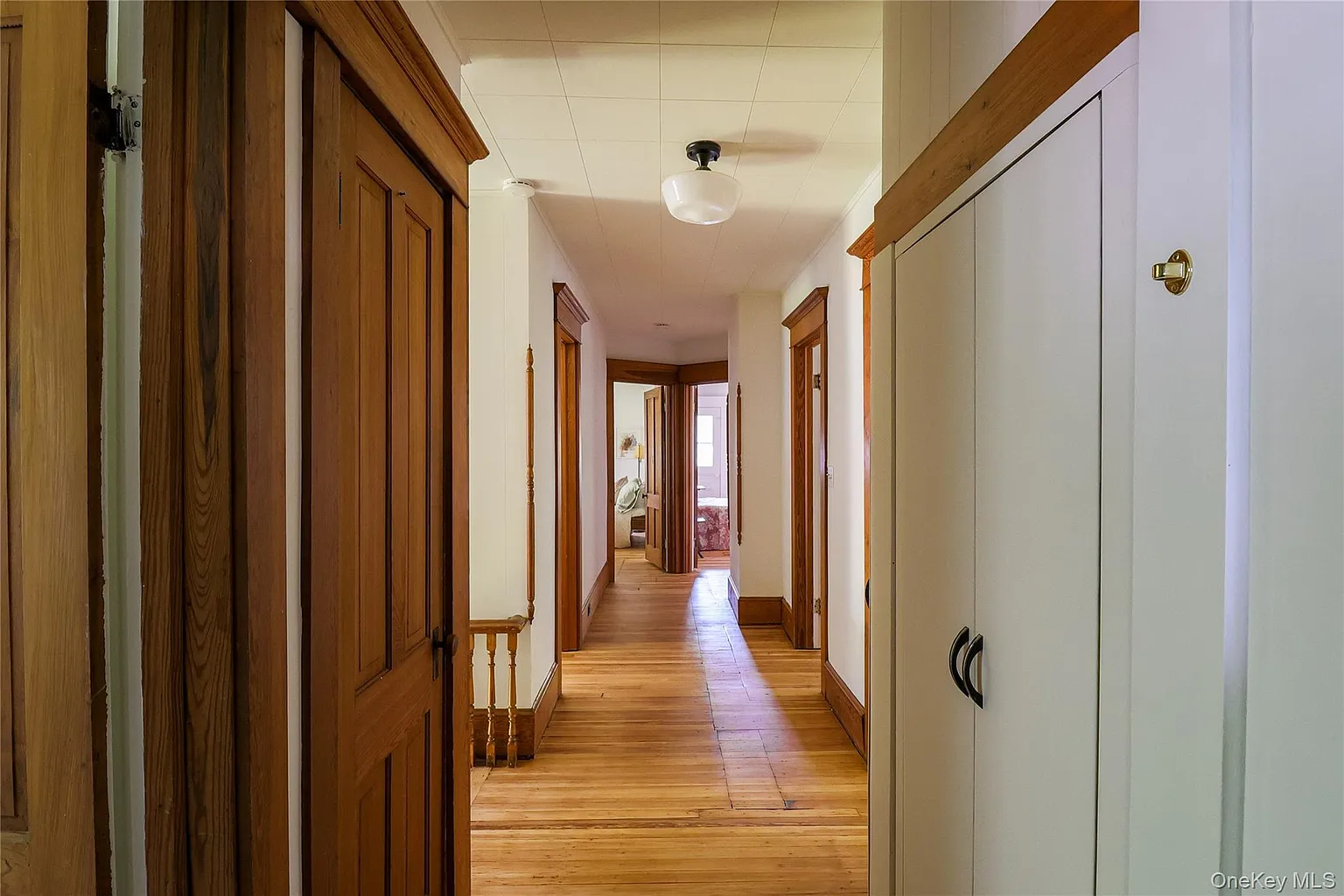 upstairs hall with wood floors