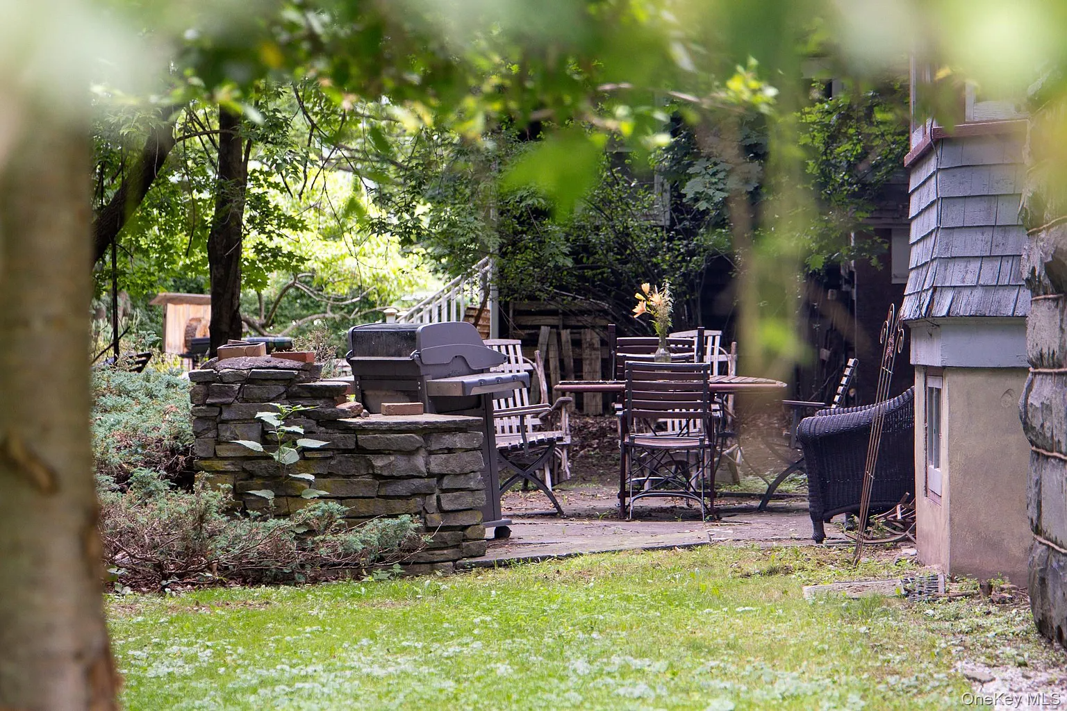 rear yard paved patio with room for seating