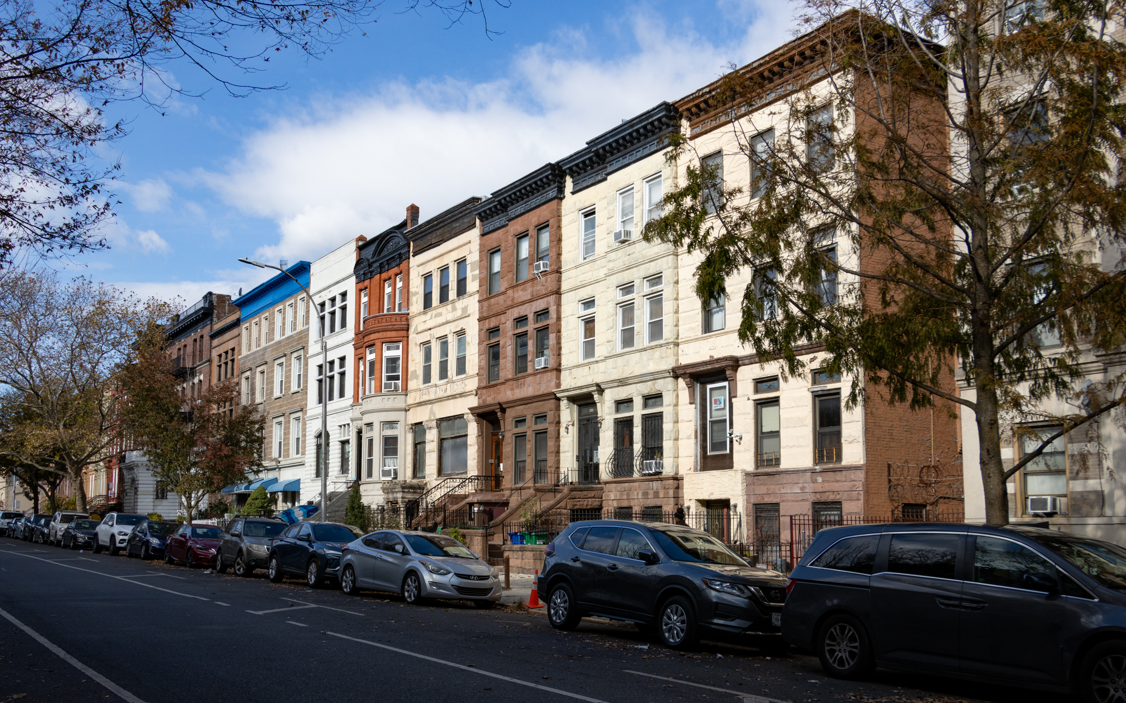 street of row houses with cornices