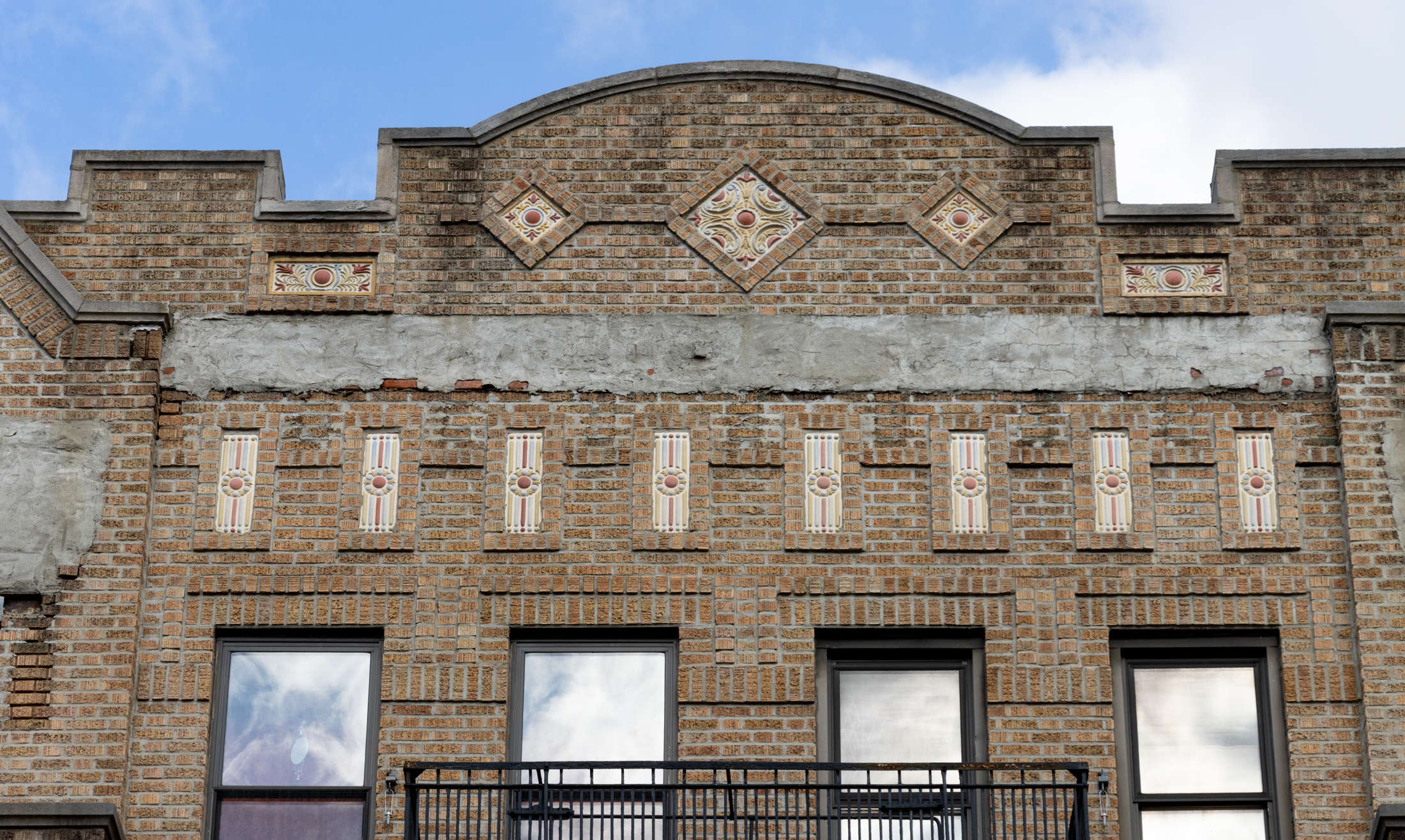 tilework on a brick building