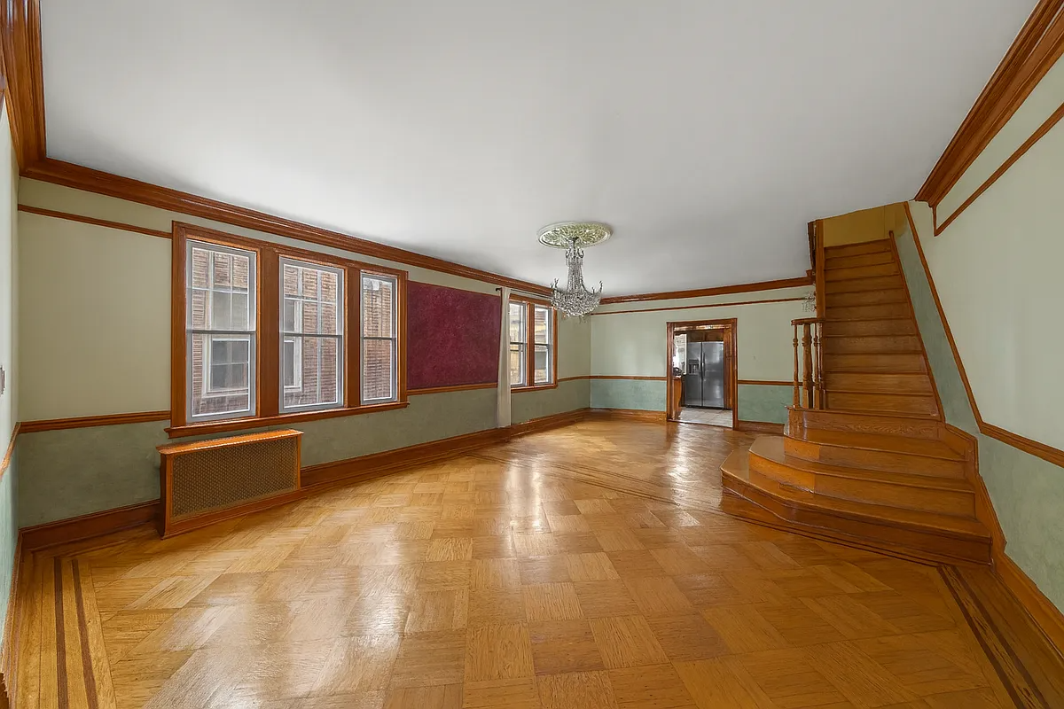 living room with wood floor, stair