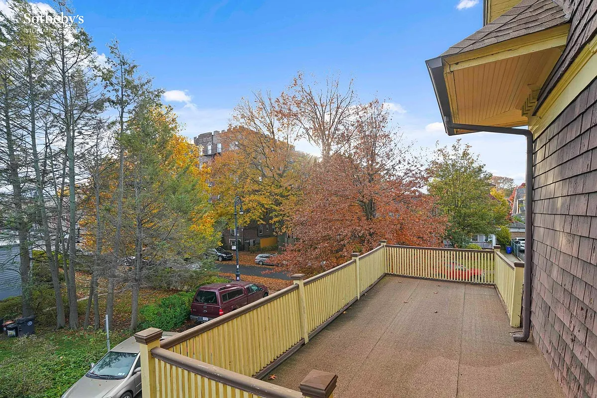 balcony with wood railing