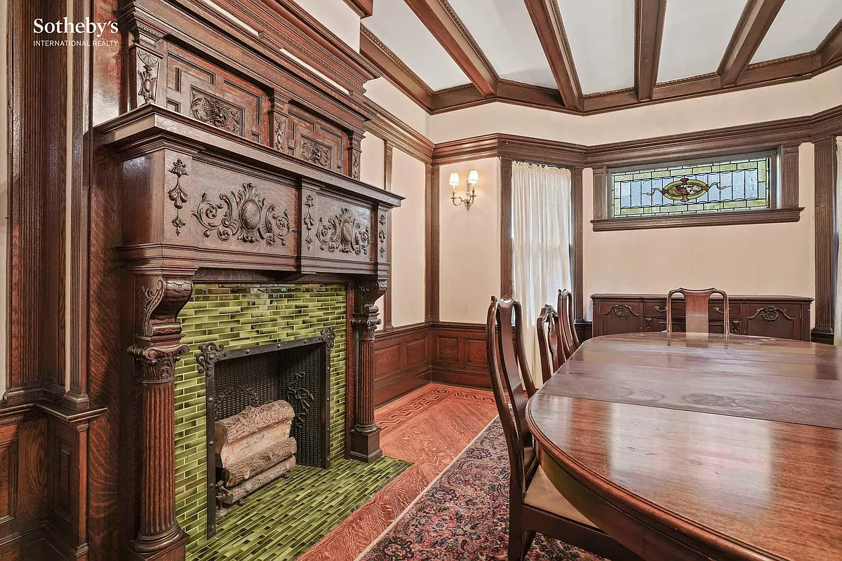 dining room with mantel with green tile