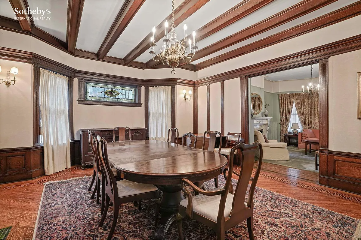 dining room with beamed ceiling