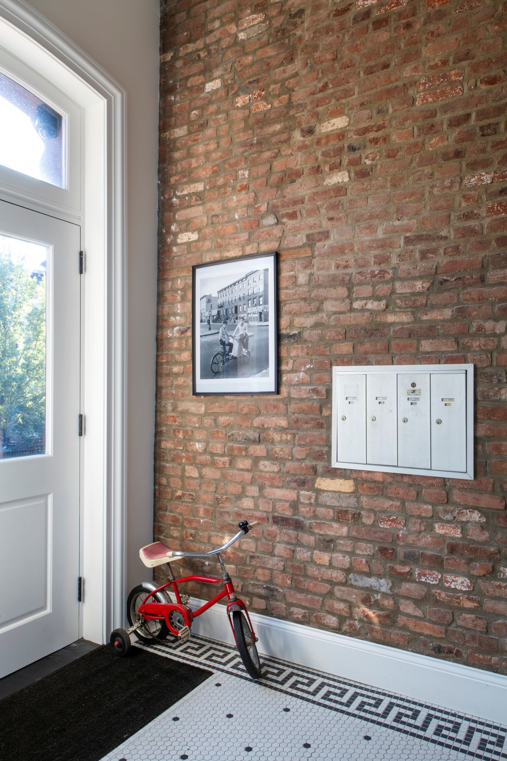 ENTRY HALL EXPOSED BRICK