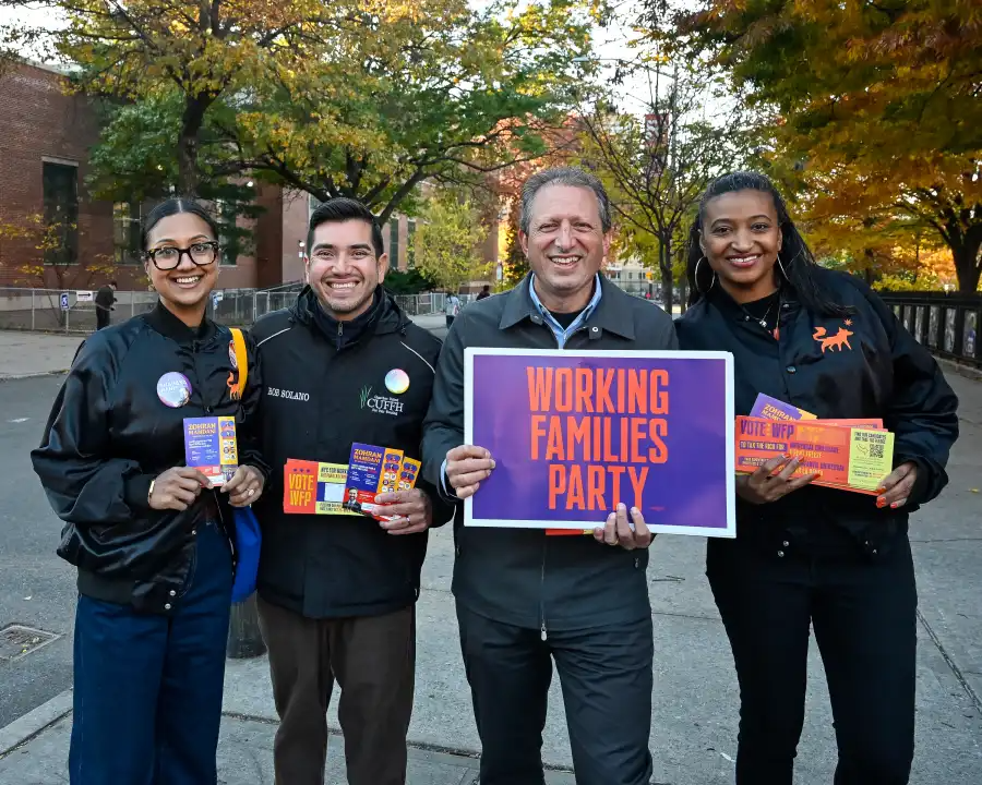 Council Member Shahana Hanif, Rob Solano, Comptroller Brad Lander, and Jasmine Gripper greet voters outside M.S. 51, a polling site in Park Slope.