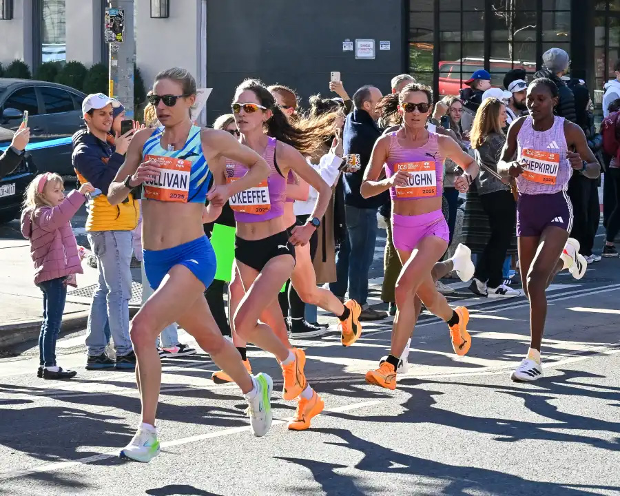 The women’s marathon elite runners make their way through Brooklyn.