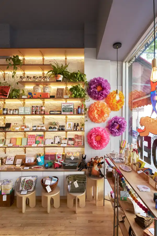 store interior with candles, paper goods and other items for sale