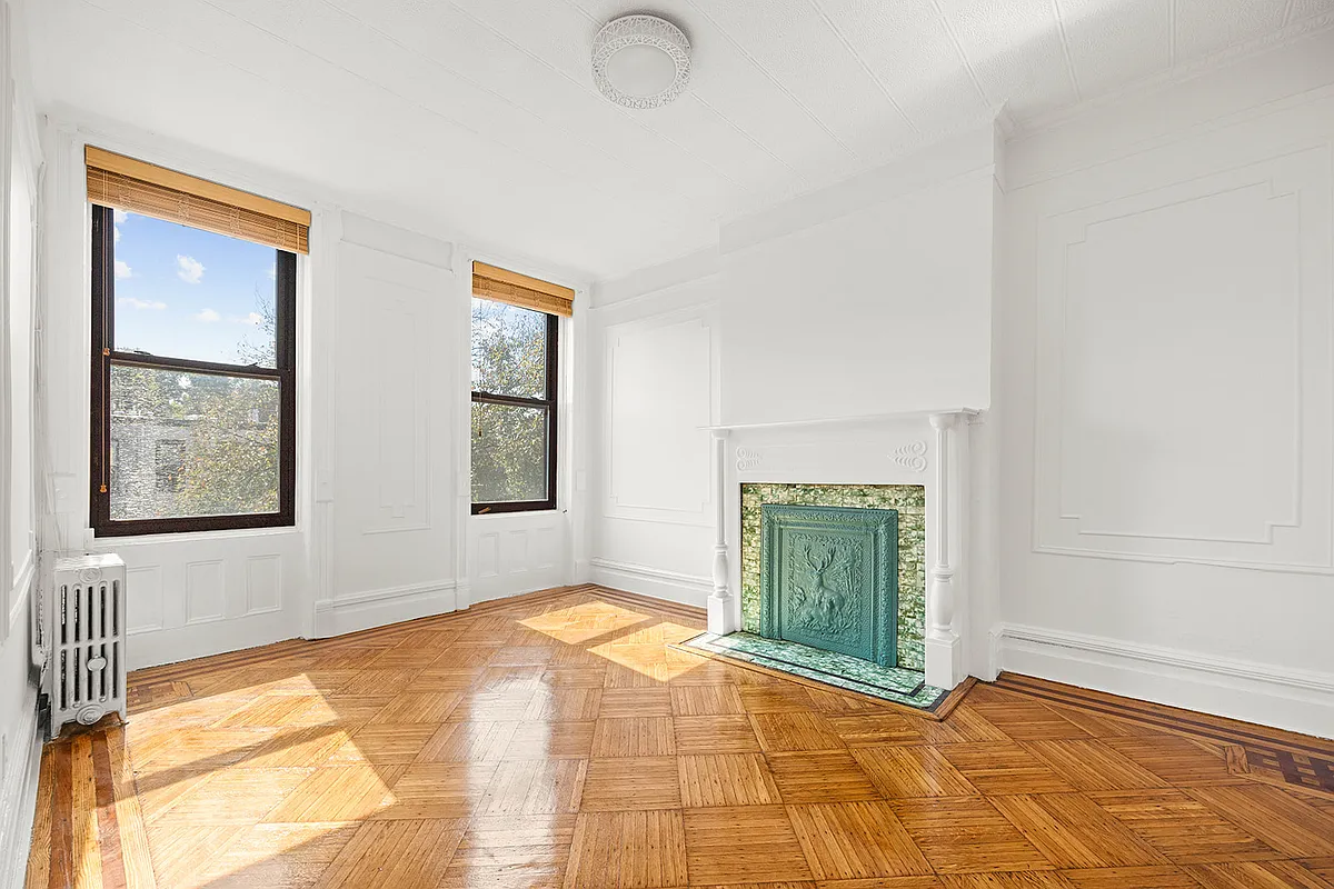 interior with columned mantel, wall moldings