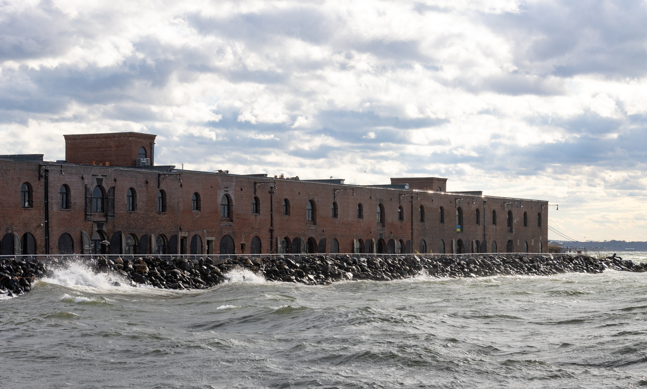 waves crashing against bulkhead in Red Hook