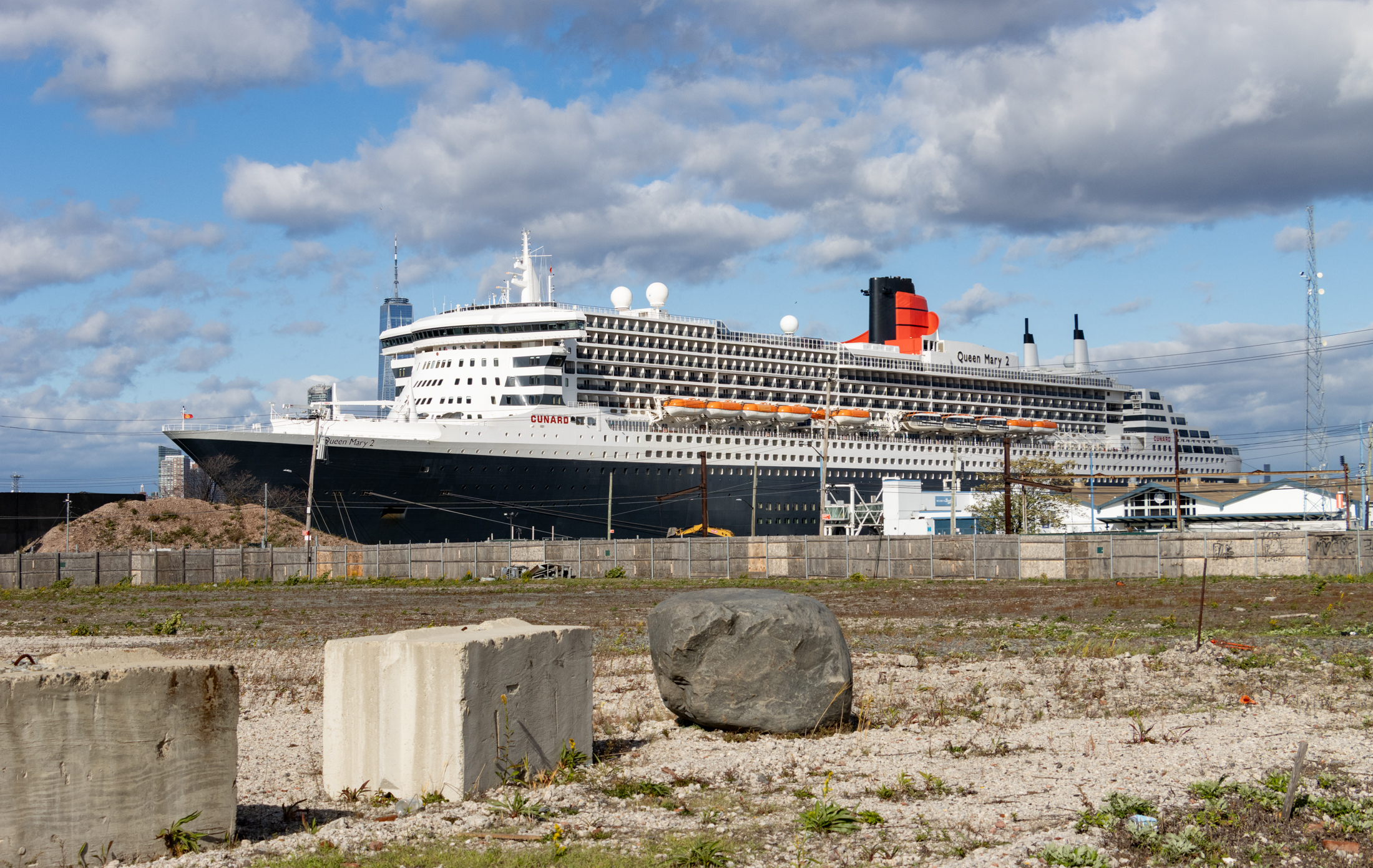 view across an empty lot to the cruise ship terminal