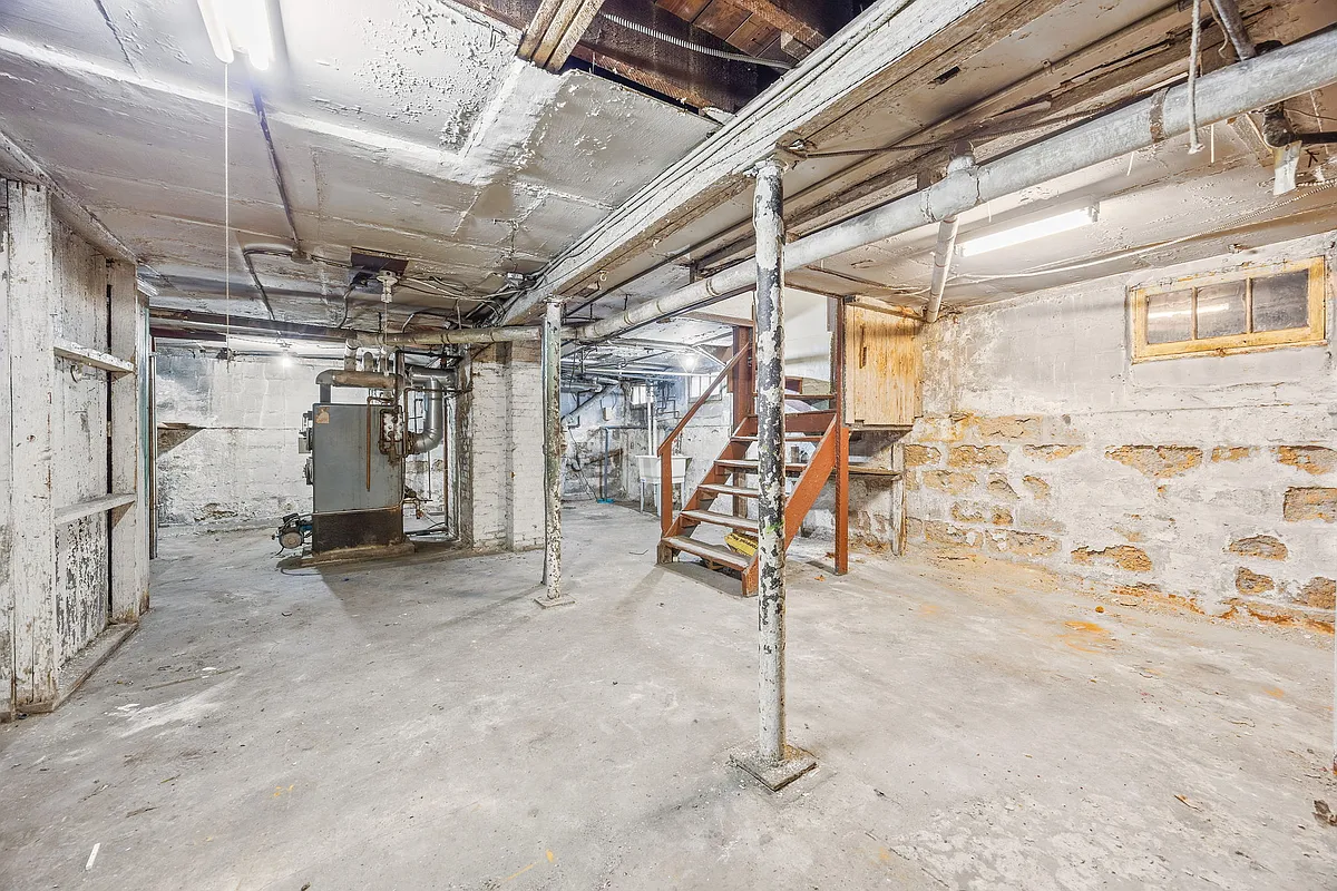 unfinished basement with boiler