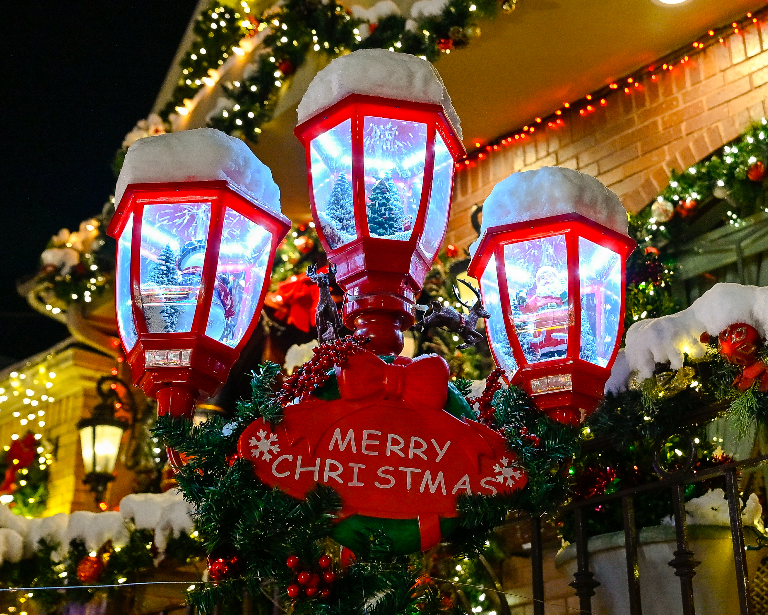 snow on a street light