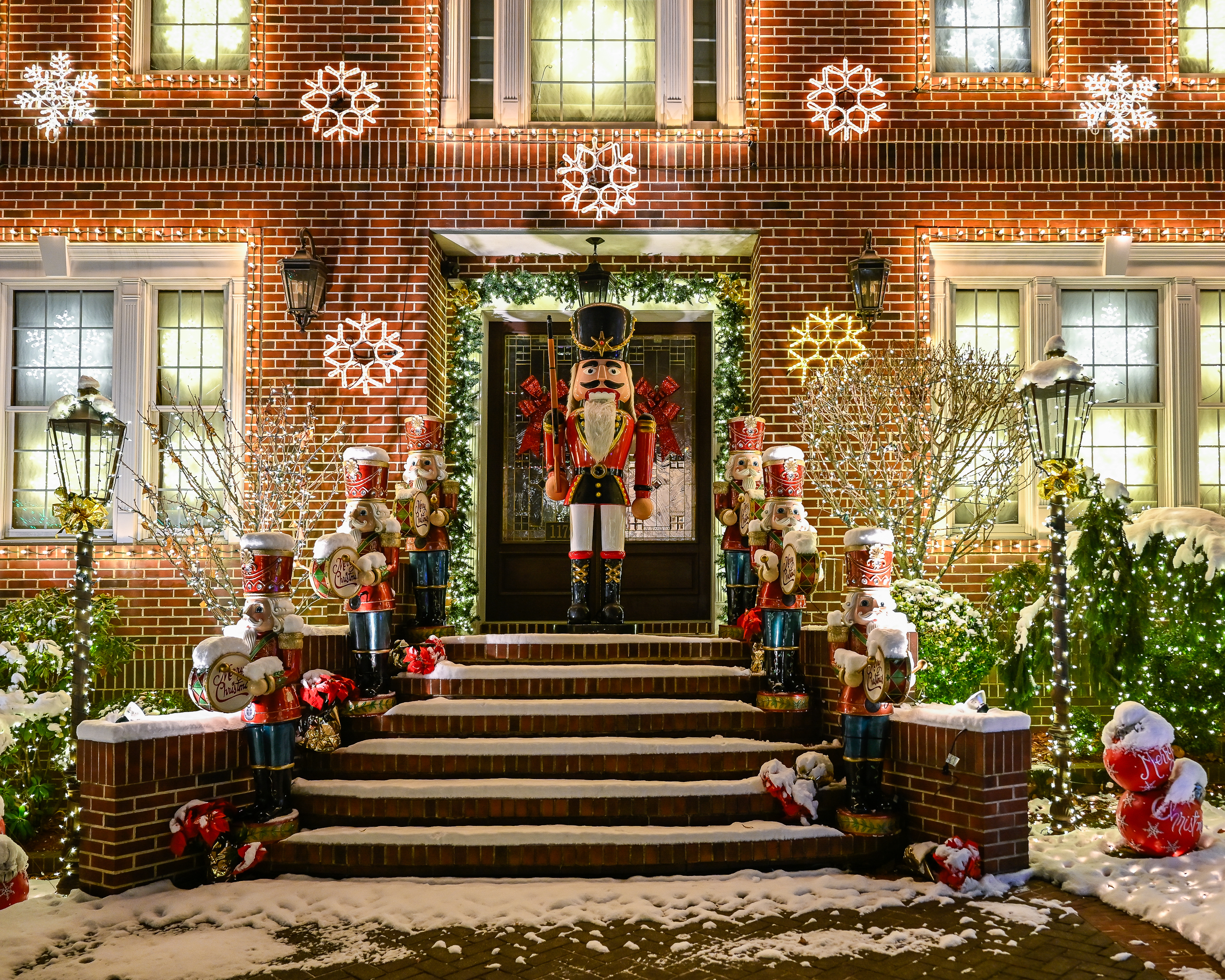 a giant nutcracker in front of a house