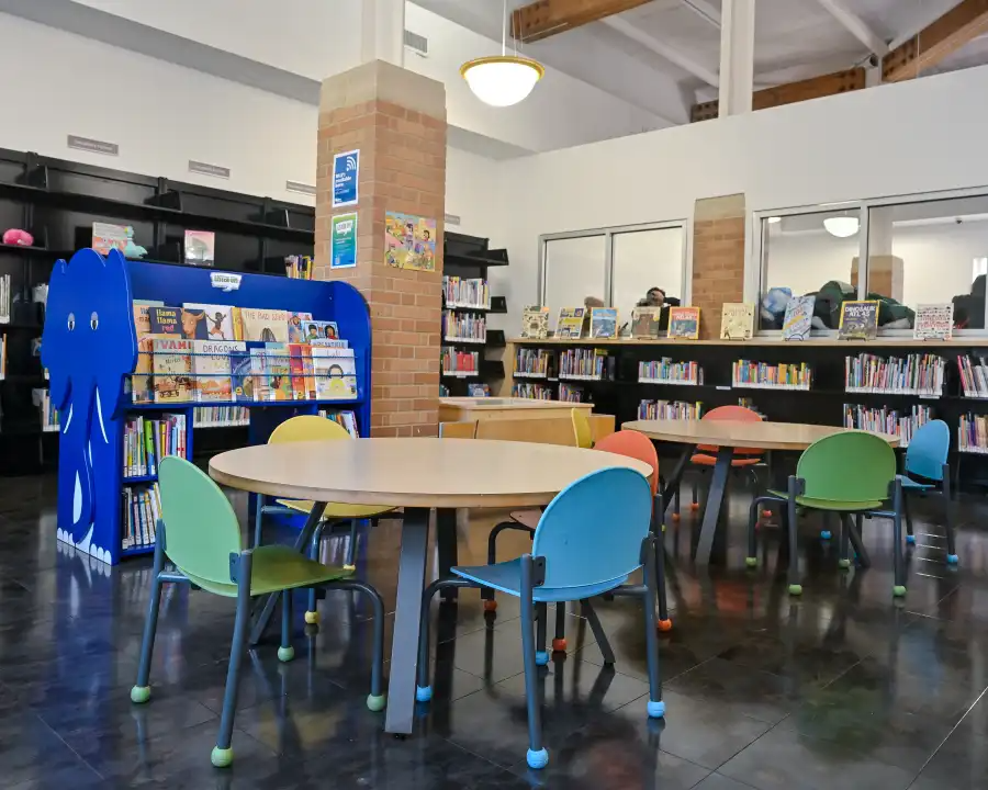 tables with colorful chairs