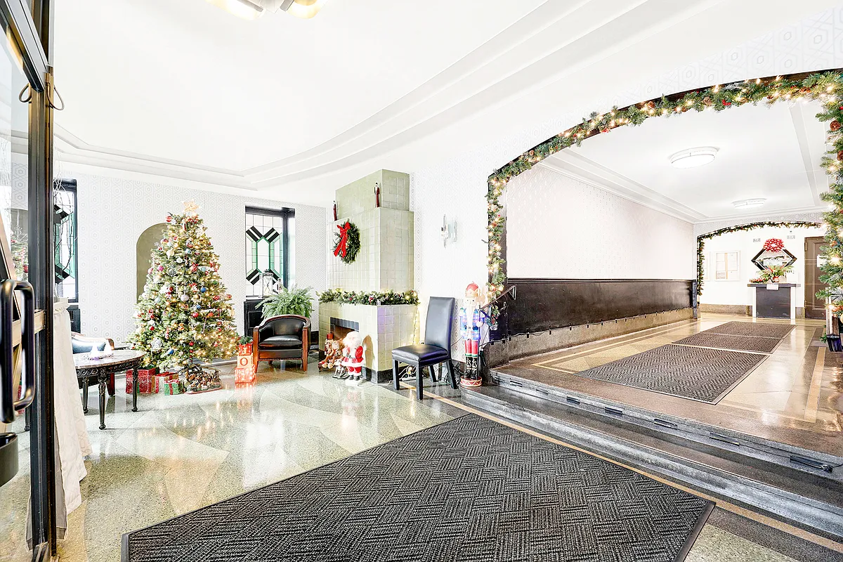 lobby with tile mantel