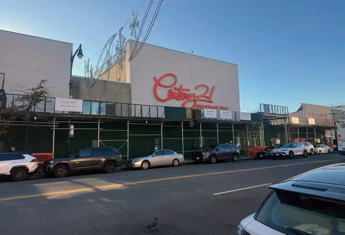 building with a sidewalk shed