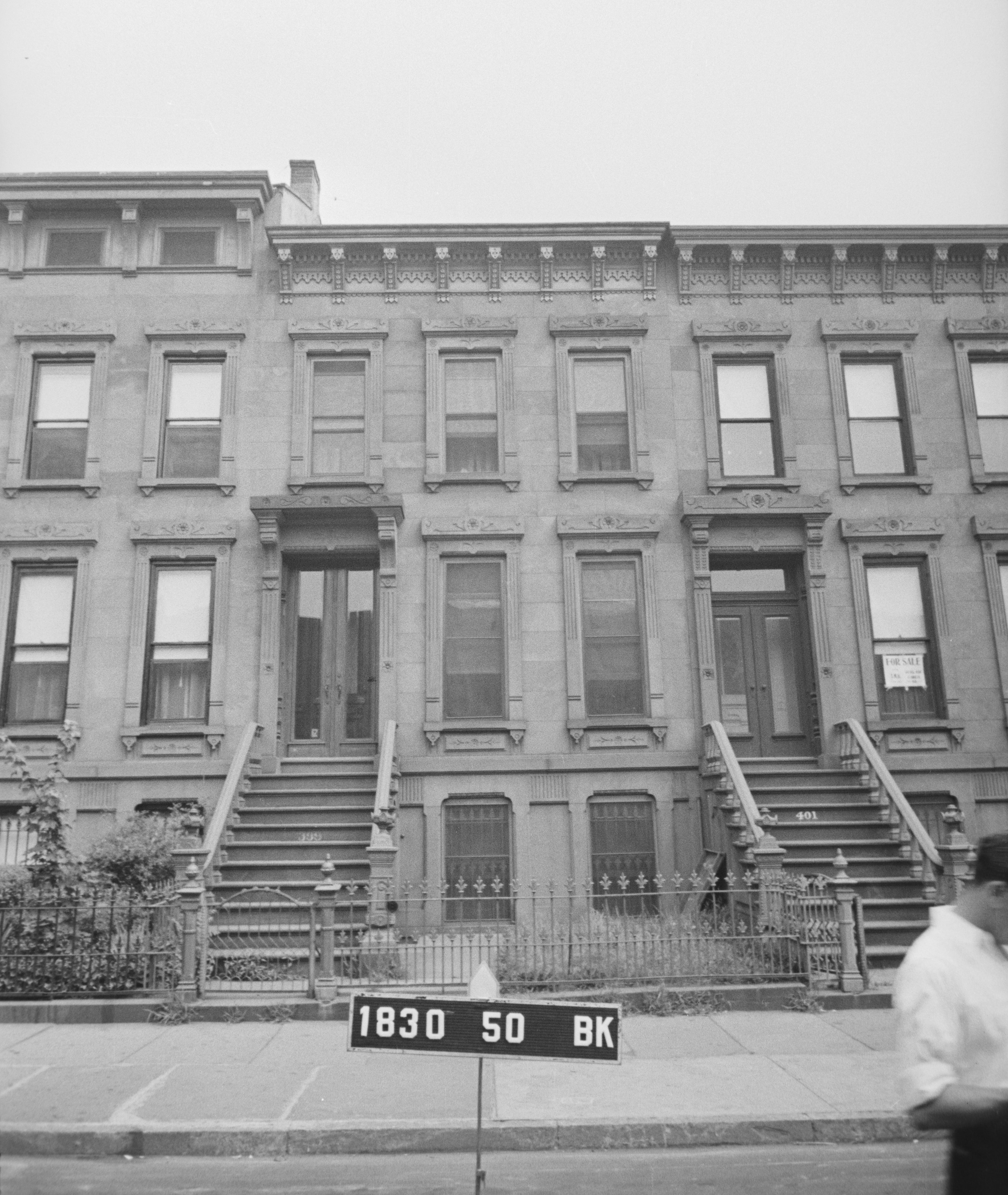 black and white photo of a row house