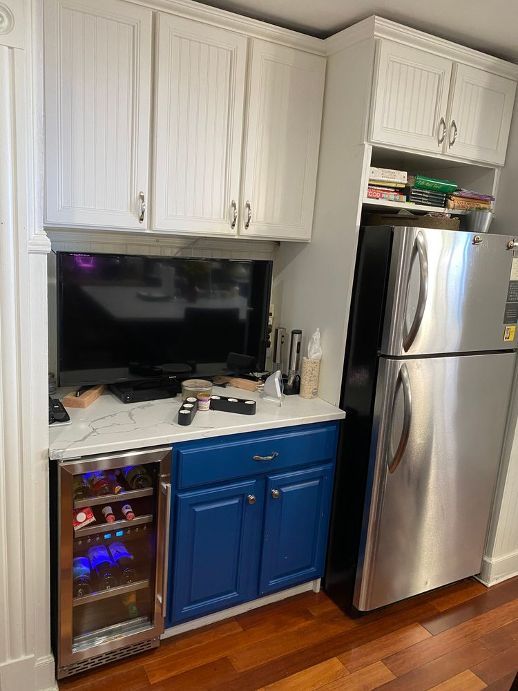 kitchen with blue and white cabinets