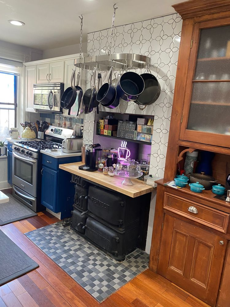 kitchen with built-in, blue and white cabinets
