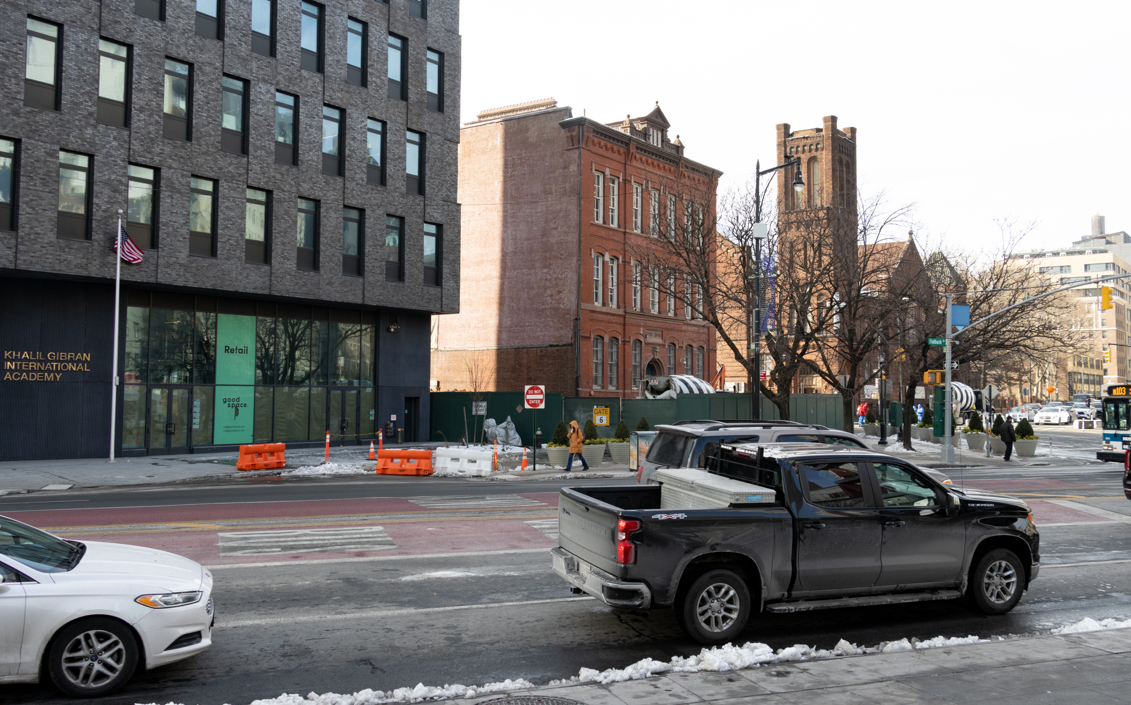 view of new and old construction including historic school