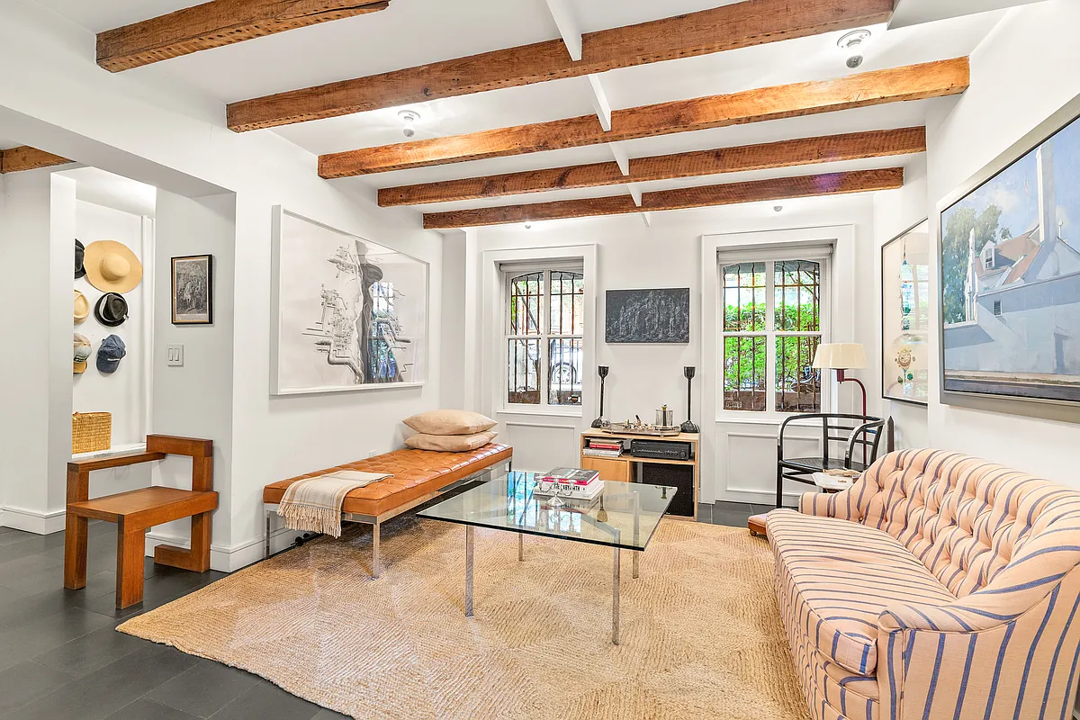 sitting area on garden level with exposed rafters