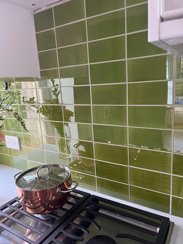 green backsplash in the kitchen
