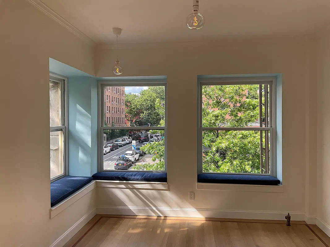 living space with two exposures and window seats