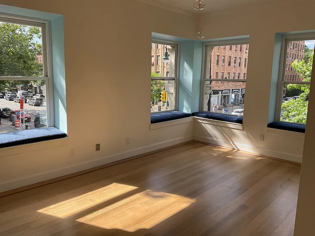 living space with two exposures and window seats