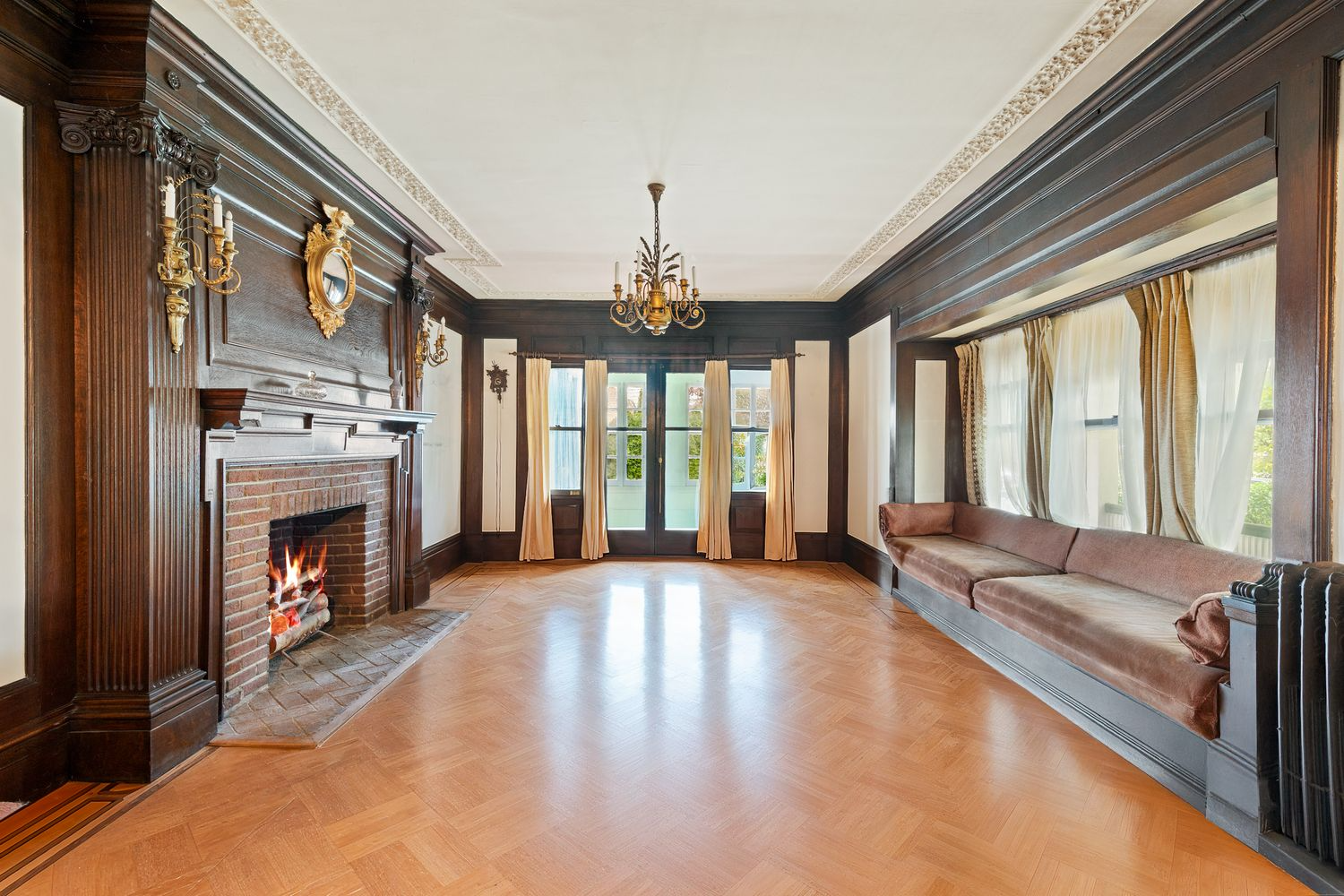 foyer with a window seat, mantel and plasterwork