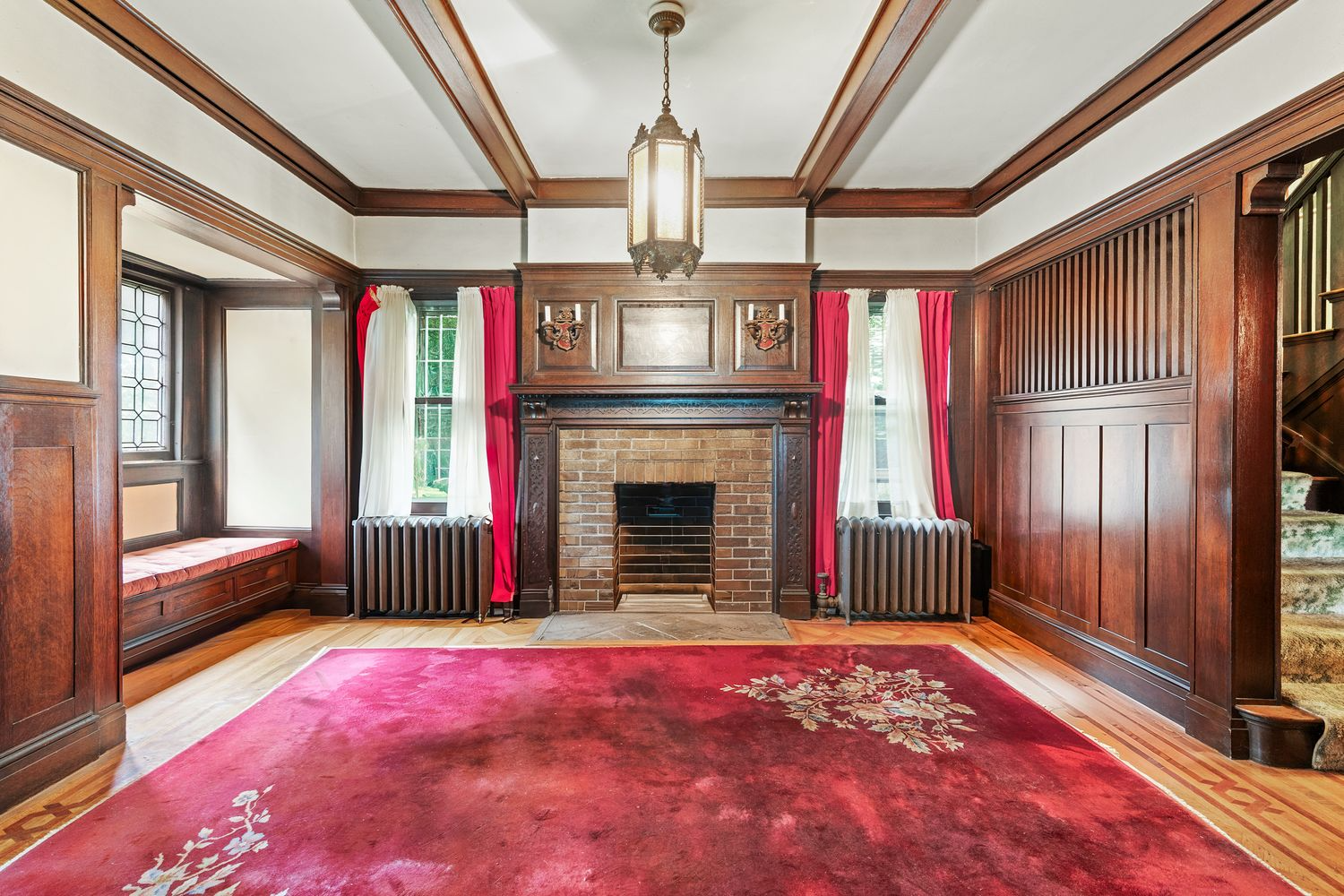 foyer with window seat and a mantel