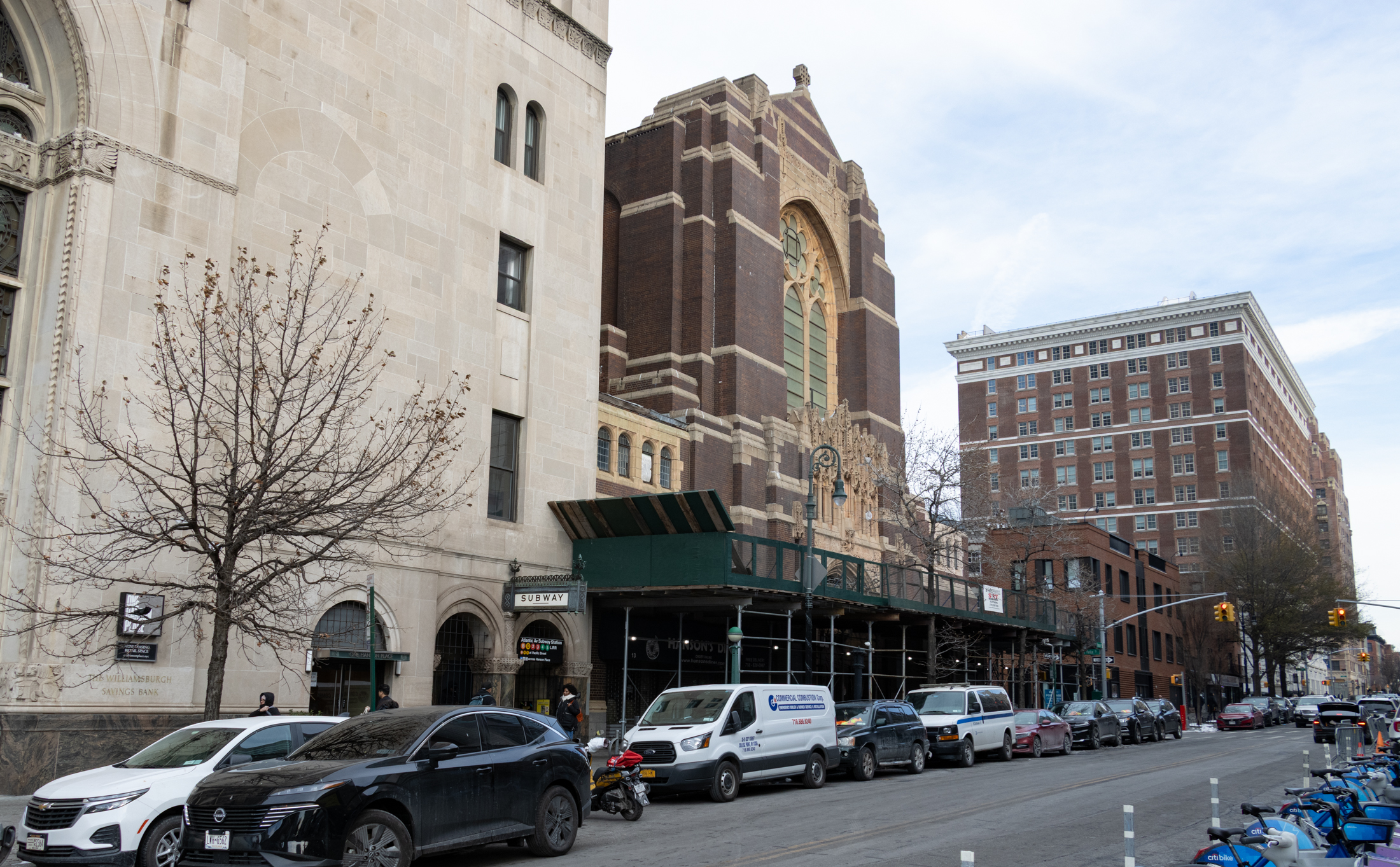 church with sidewalk shed around it
