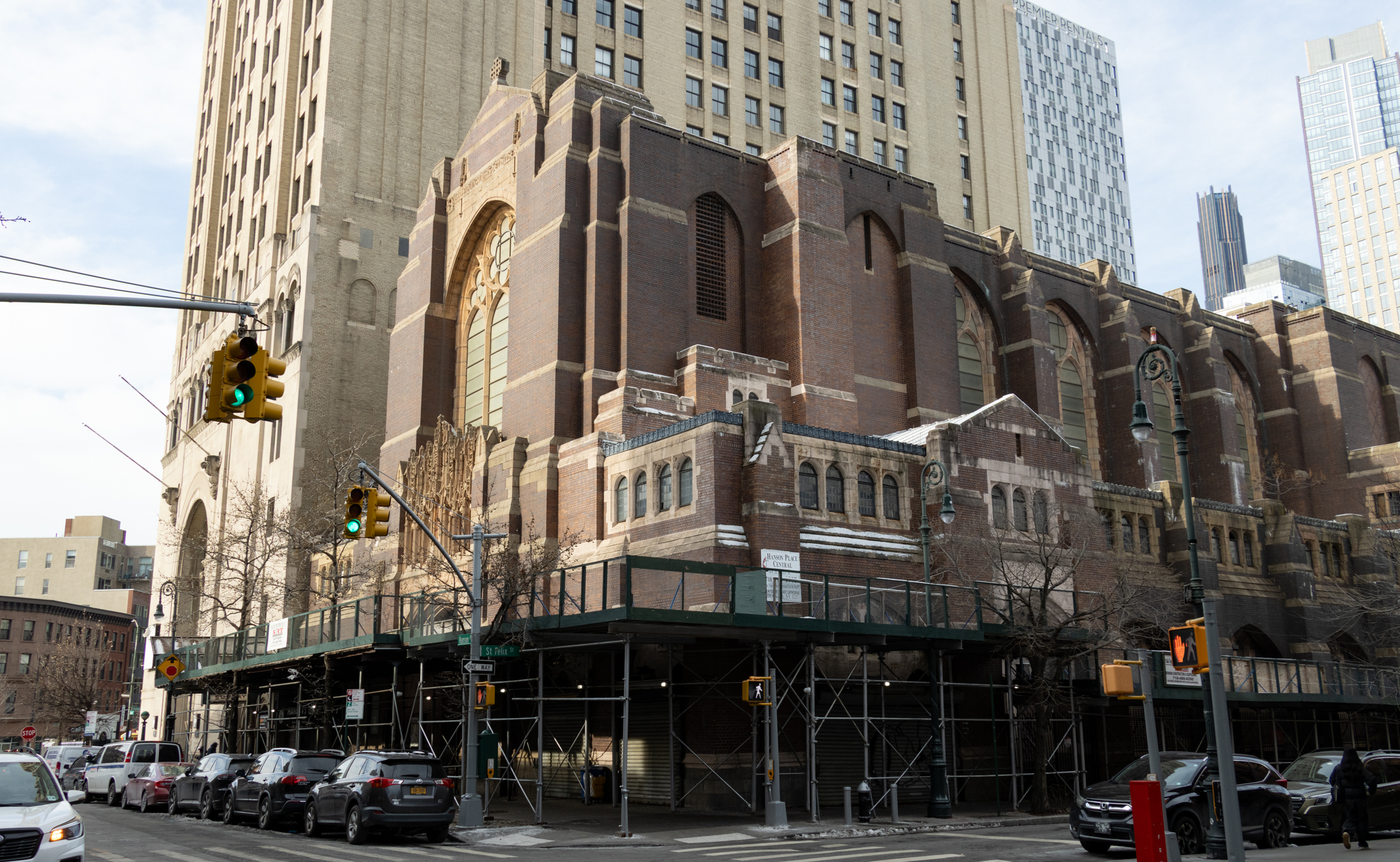 church surrounded by a sidewalk shed