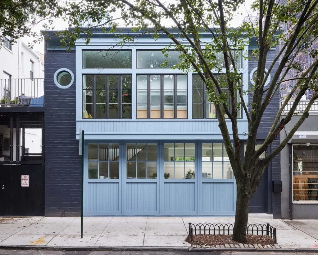 EXTERIOR of a blue carriage house