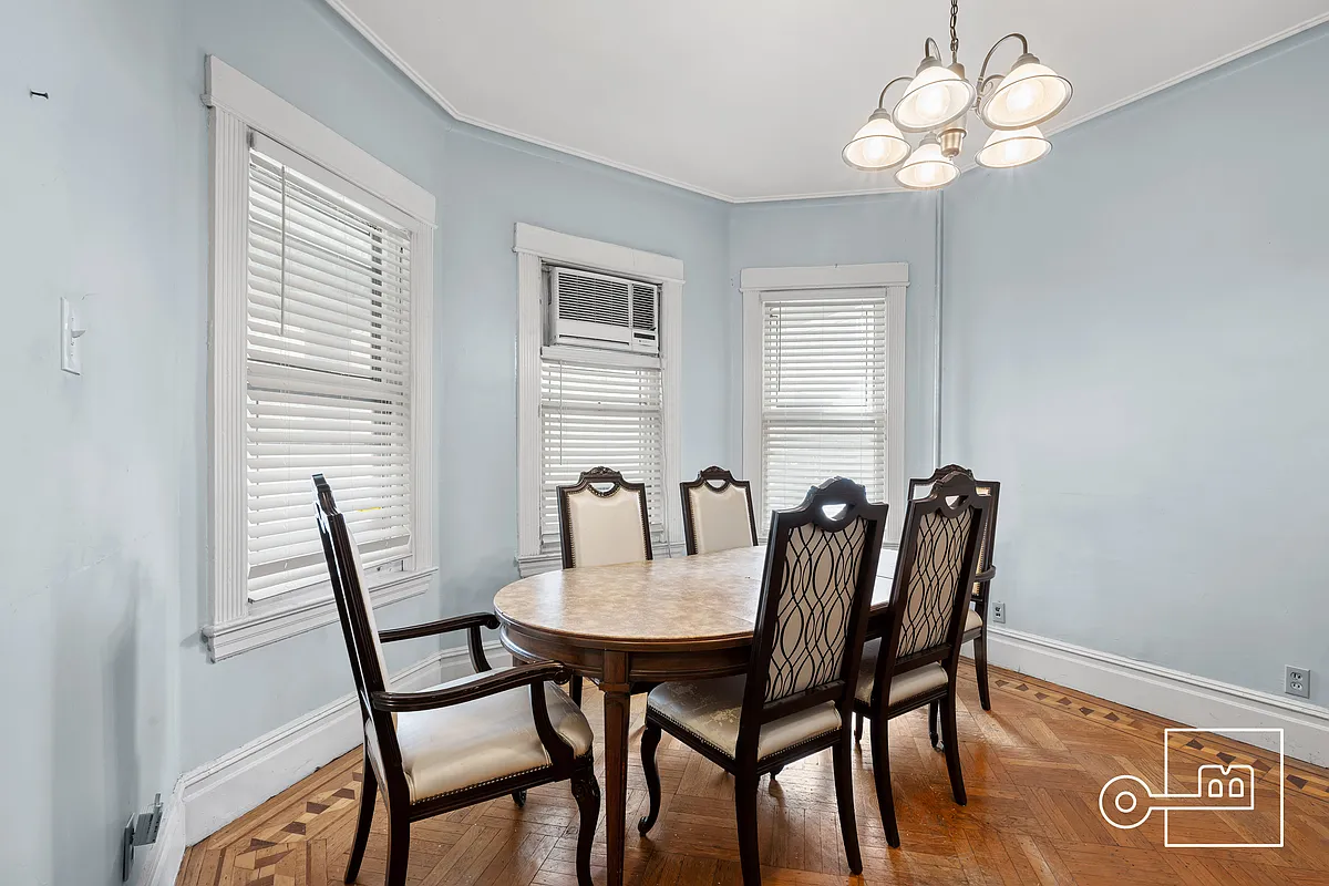 dining table set in a bay window