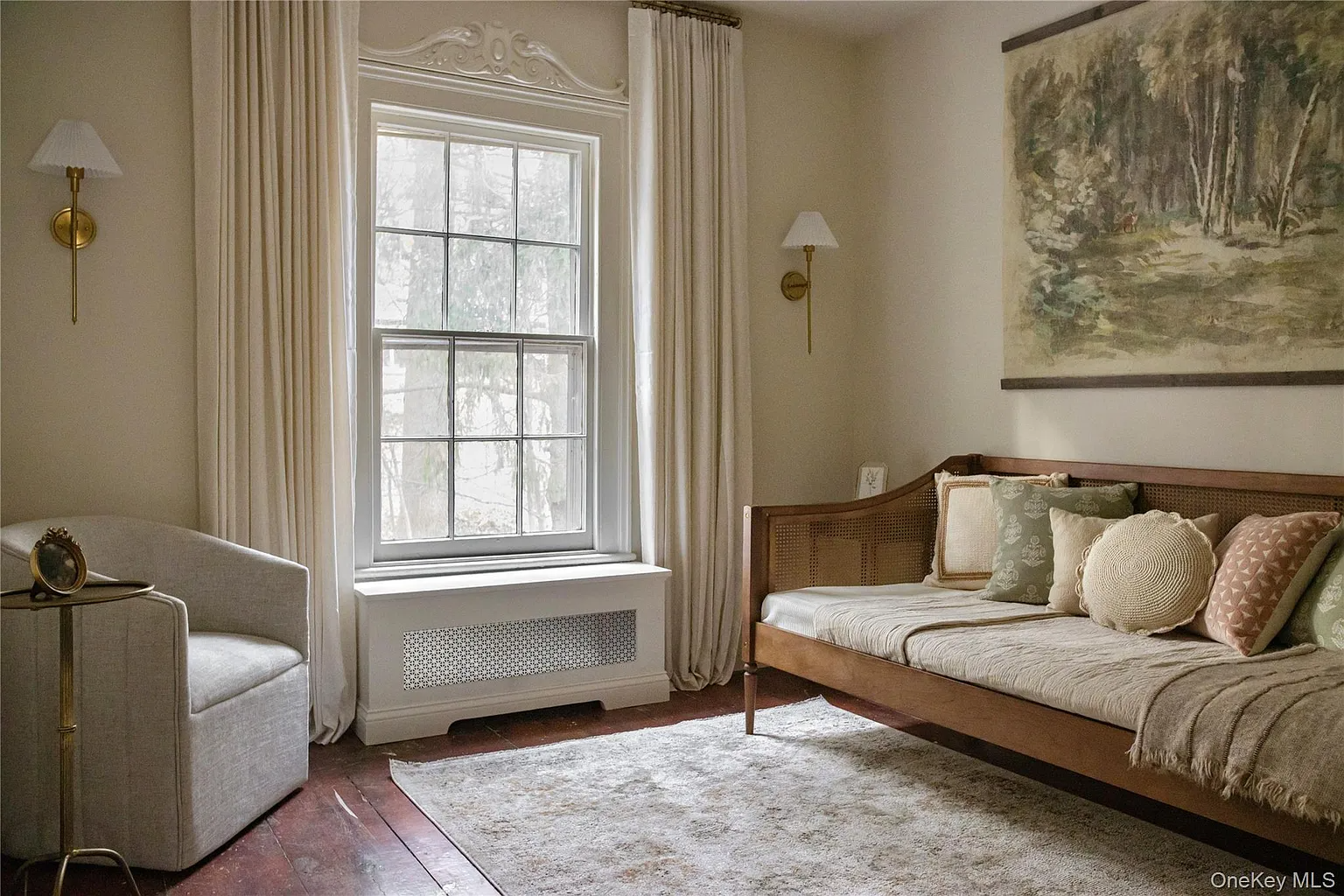 small room with sofa, white walls