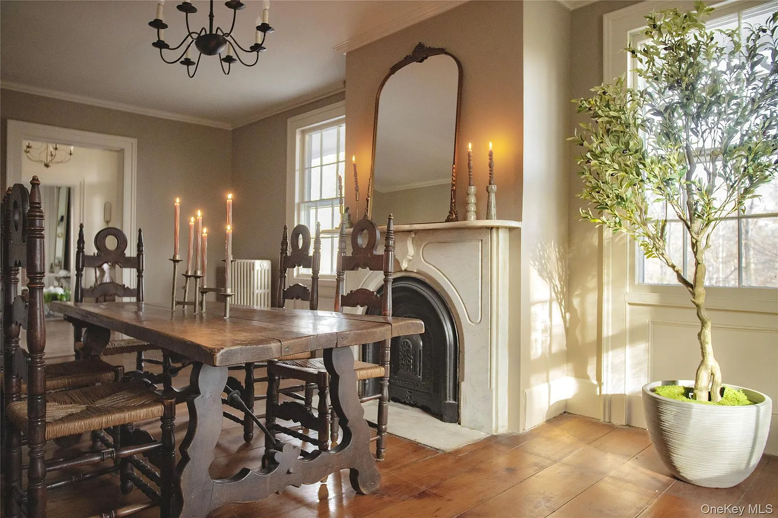 dining room with a marble mantel