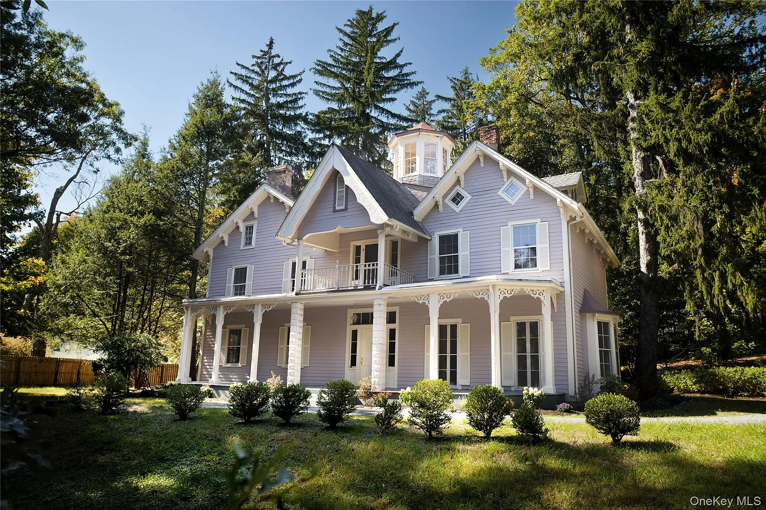 house exterior with clapboard and bracketed cornice